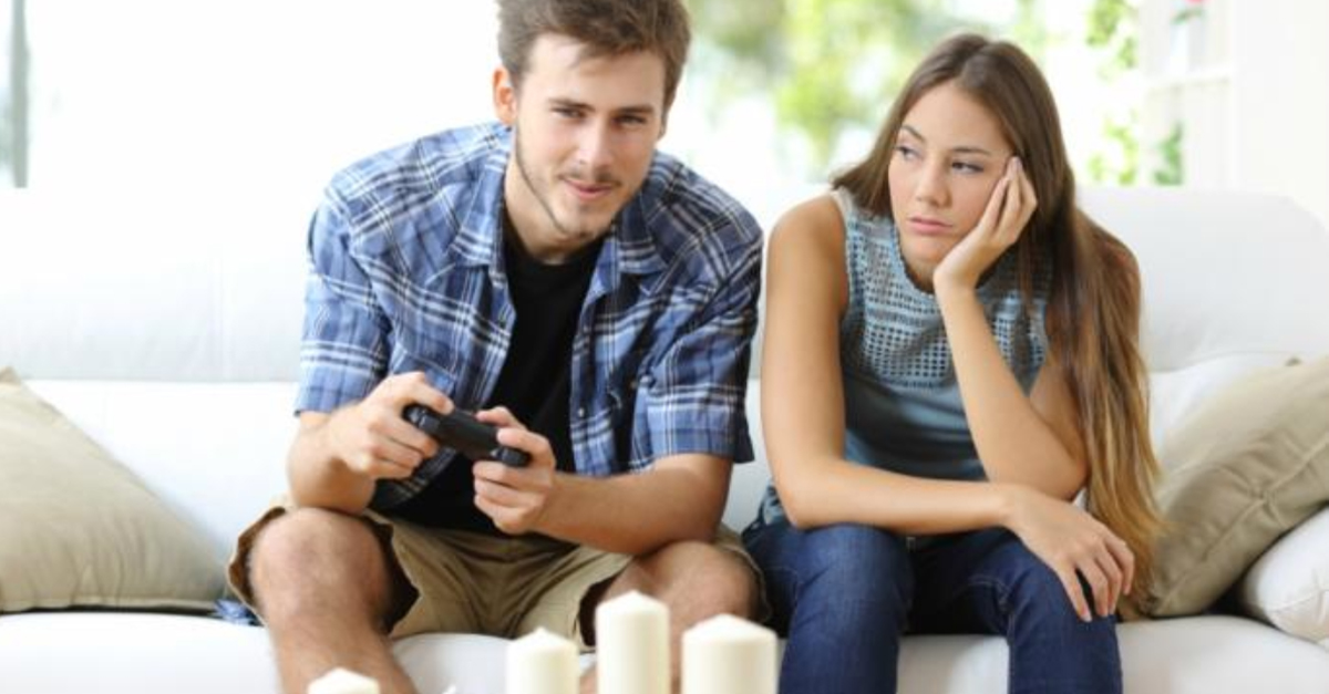My boyfriend can barely tear his face away from his video games to talk to me anymore. I feel like he loves his games more than me. What should I do?